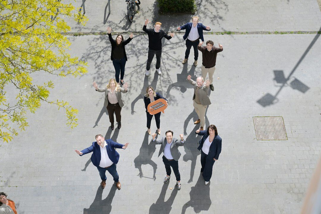 person celebrating achievement outdoors