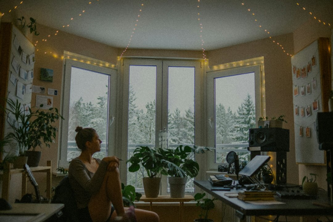 person reflecting alone in quiet room