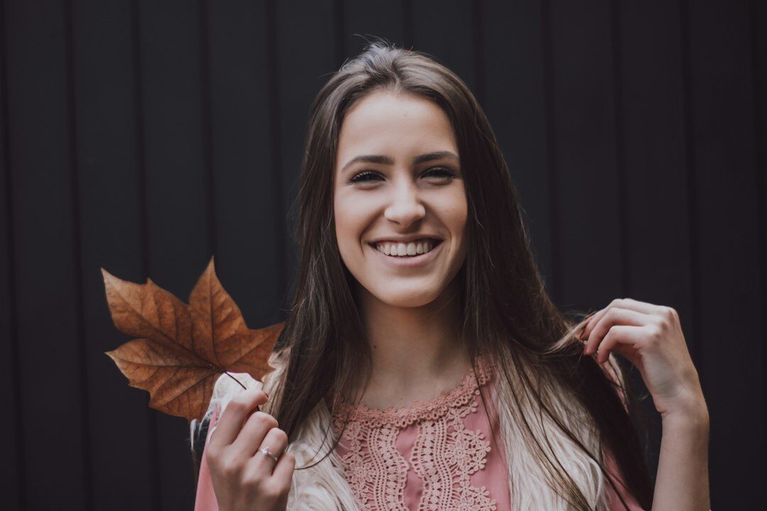 Portrait of a young Brazilian woman with straight hair smiling