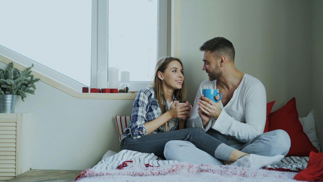 couple having deep conversation at home