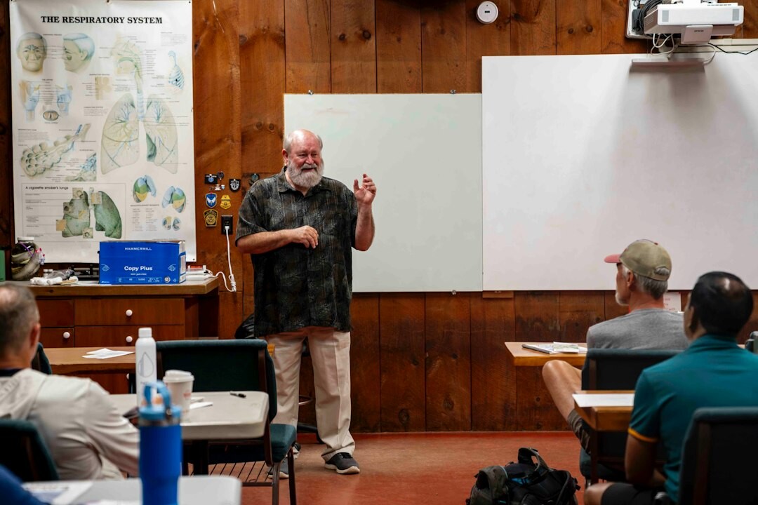 instructor leading communication class