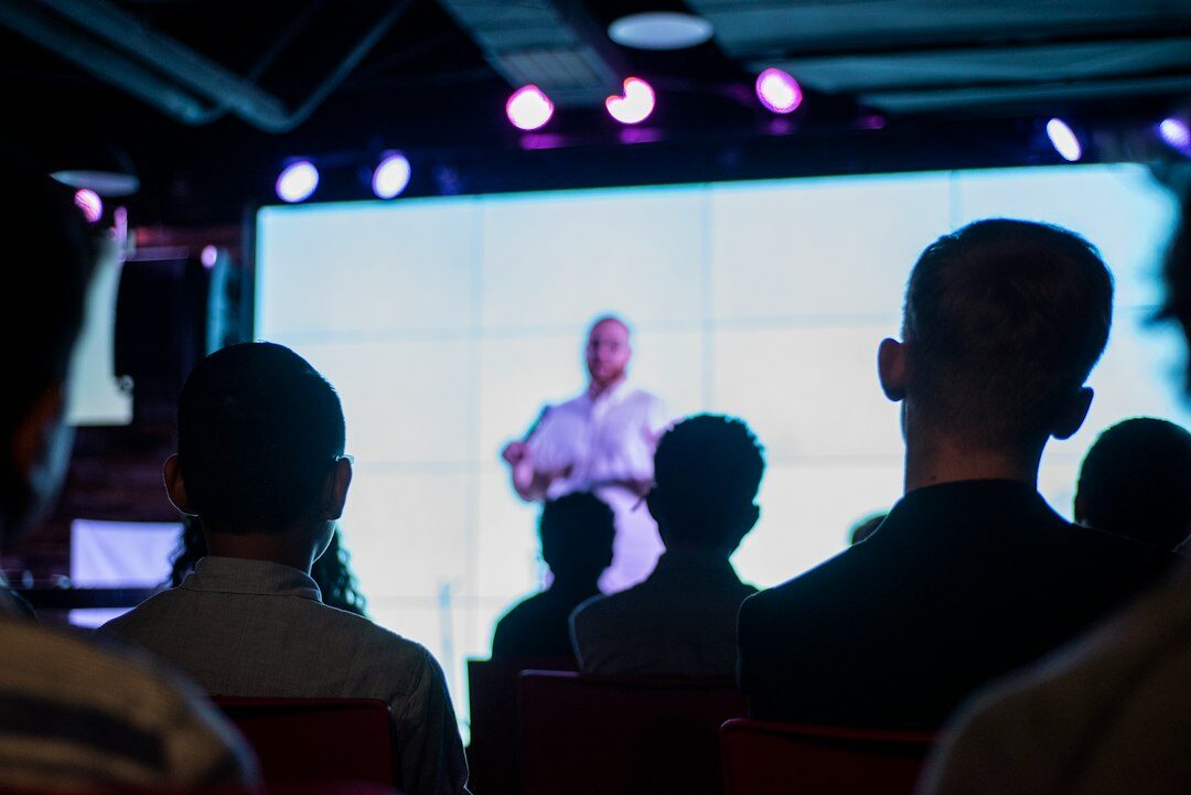 confident speaker presenting ideas